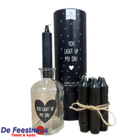 Koker met 7 kaarsjes en glazen houder met tekst: You light up my day